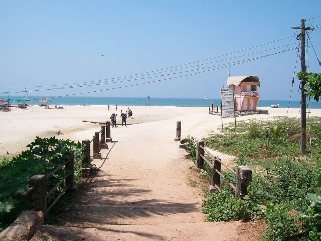 Majorda Beach in Goa with golden sand, swaying palms, and calm waves, one of the best Things to Do in Goa in 2026.