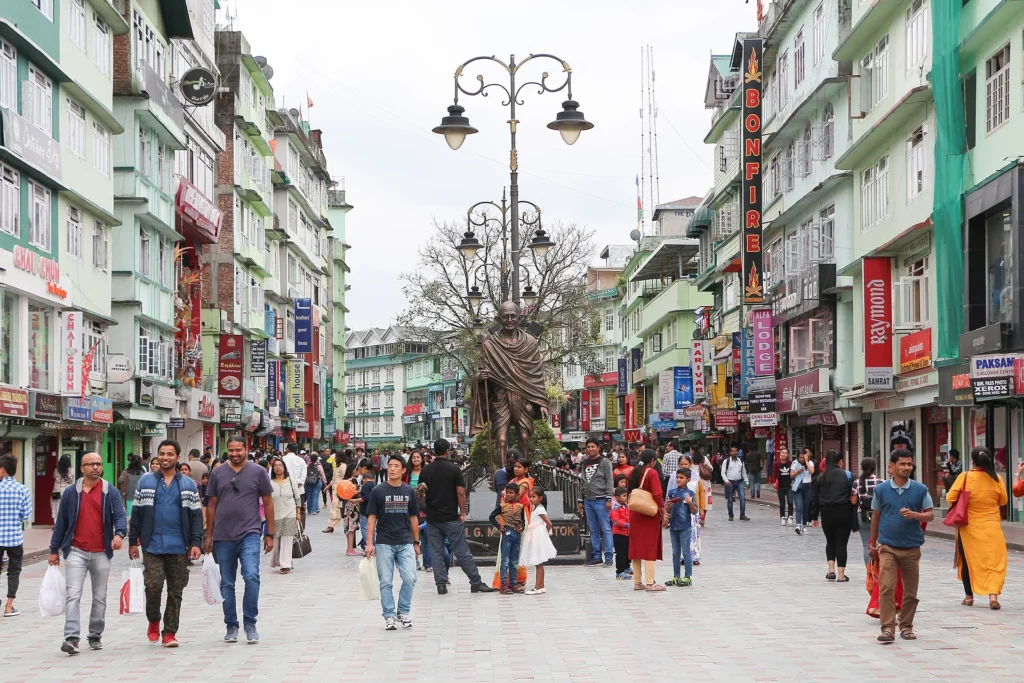 Beautiful Gangtok city with Himalayan mountain views, vibrant streets, and lush greenery, among the best Places to Visit in Sikkim for tourists in 2026.