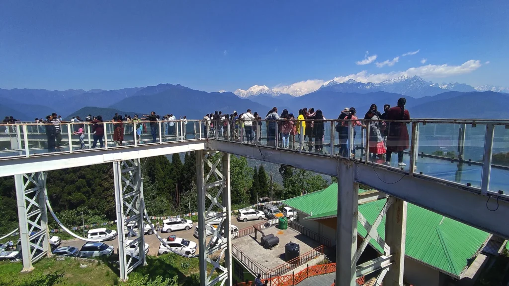 Pelling Skywalk in Pelling, one of the top Places to Visit in Sikkim, with Himalayan mountain views and Buddha statue