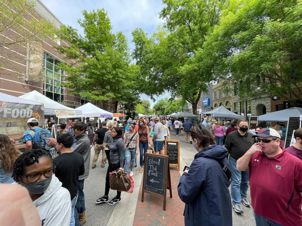 Soda City Market in Columbia, SC bustling with local vendors, food stalls, and shoppers enjoying things to do in Columbia.