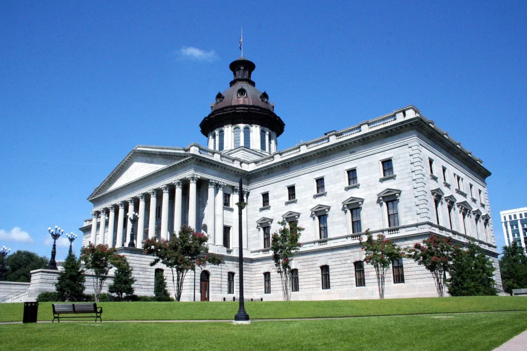 South Carolina State House in downtown Columbia, South Carolina, featuring its historic granite dome, landscaped grounds, and iconic architecture, one of the top Things to Do in Columbia for history lovers and sightseeing visitors in 2026.