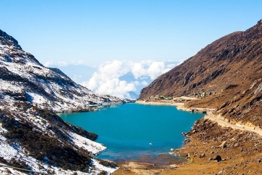 Tsomgo (Changu) Lake surrounded by snow-capped Himalayan mountains and crystal-clear waters, one of the most scenic Places to Visit in Sikkim for nature lovers and adventure travelers in 2026.
